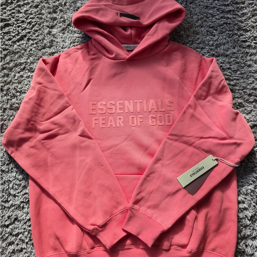 Fear of God Essentials Hoodie in Coral